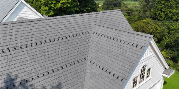 Roof with RMSG Everest Snow Guards retrofitted onto it Roof with RMSG Everest Snow Guards retrofitted onto it